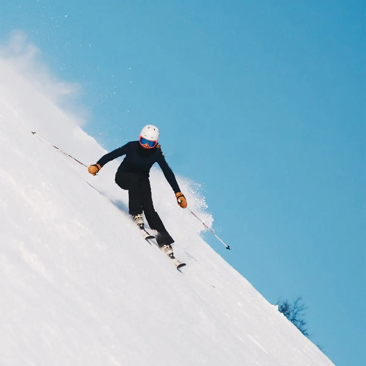 Professional skier wearing solestar ski insoles in the snow